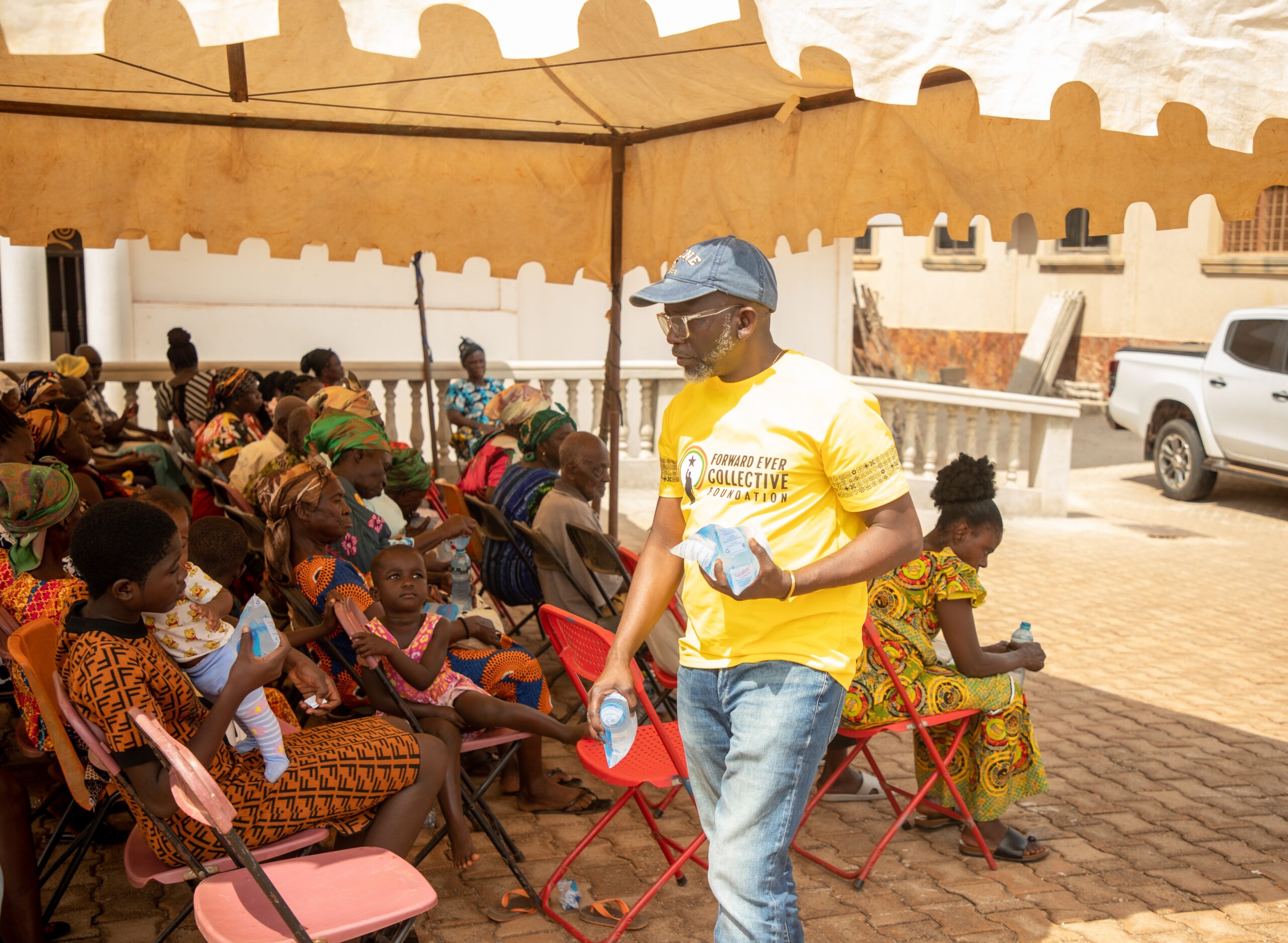 FECF volunteers bringing water and essentials to community elders