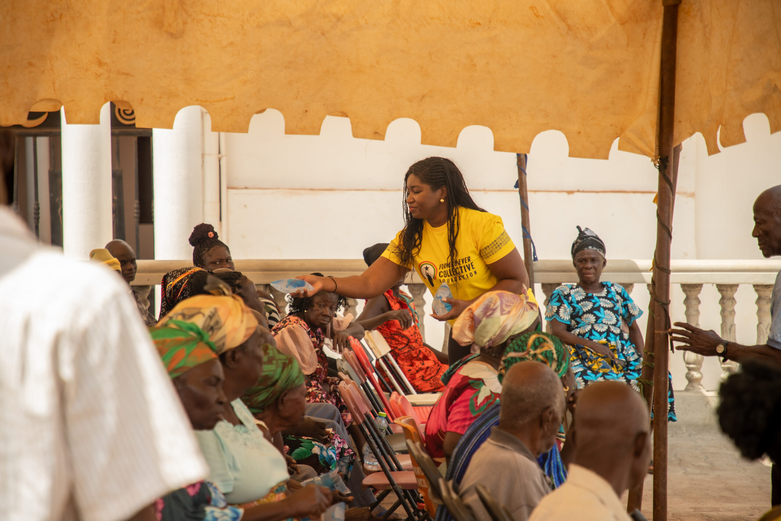 Distributing water and essentials to community elders